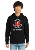 A man wearing a black pullover hoodie with a red and white graphic that reads 'EMOTIONAL SUPPORT HUSBAND DO NOT PET' on the front, paired with light blue jeans, against a plain white background.