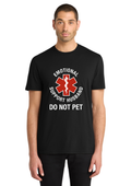 A man wearing a black short-sleeve t-shirt with a graphic print that reads 'EMOTIONAL SUPPORT HUSBAND DO NOT PET' around a red and white star-of-life style medical symbol, shown against a plain white background.