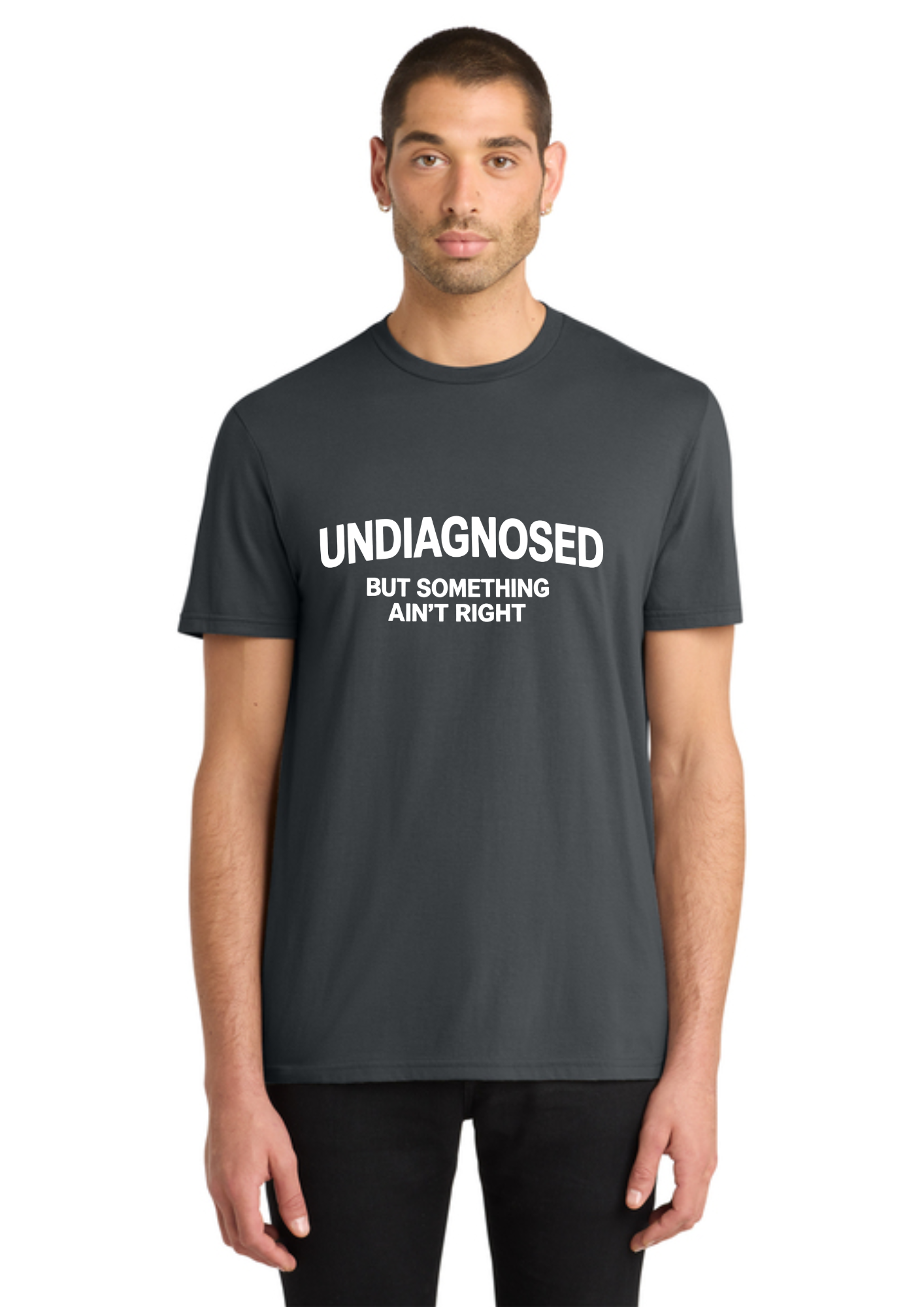 A man wearing a dark gray crewneck t-shirt with white printed text that reads 'UNDIAGNOSED BUT SOMETHING AIN'T RIGHT', shown against a plain white background.